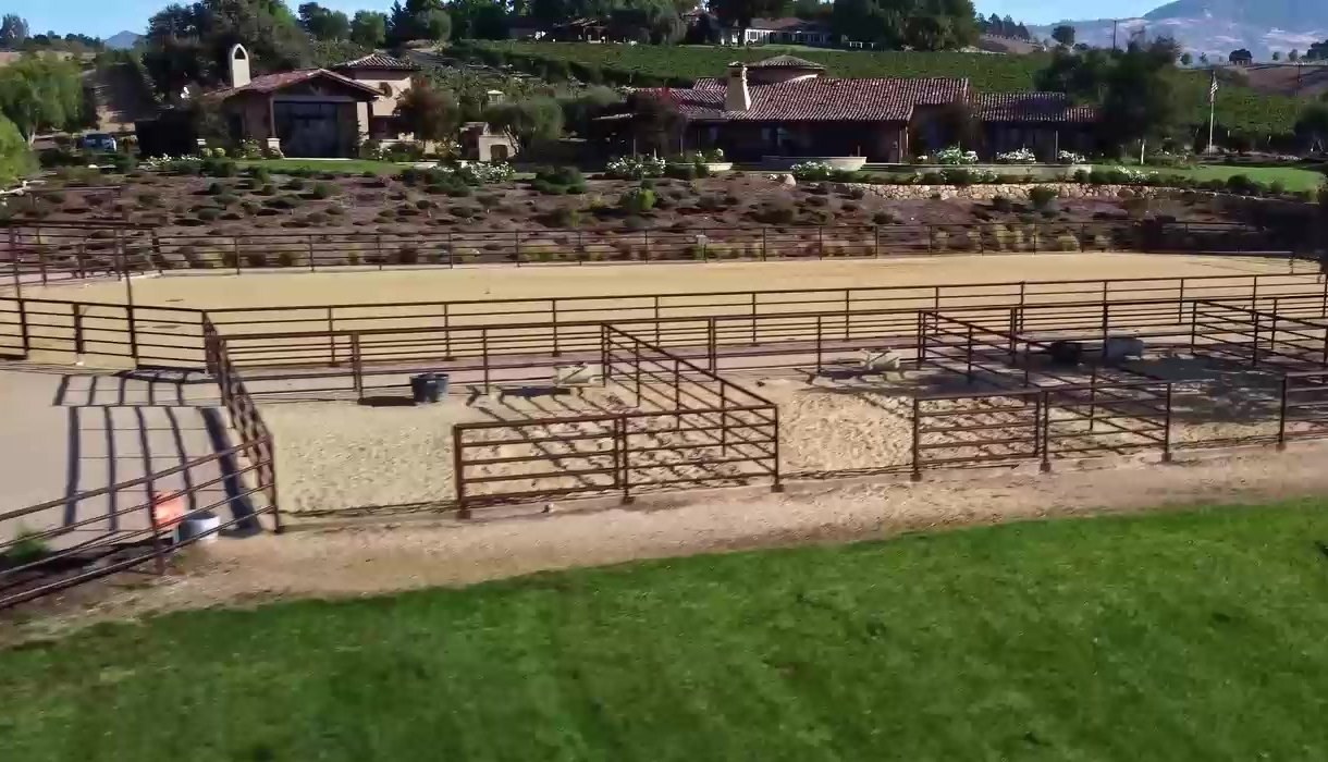 Steel pipe horse corrals and panels at a ranch estate