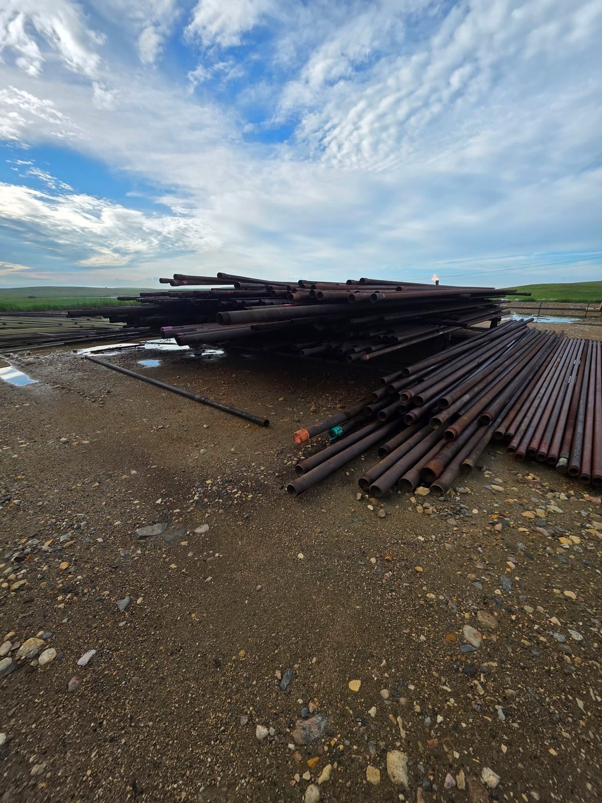 Oilfield pipe we buy, staged in the field